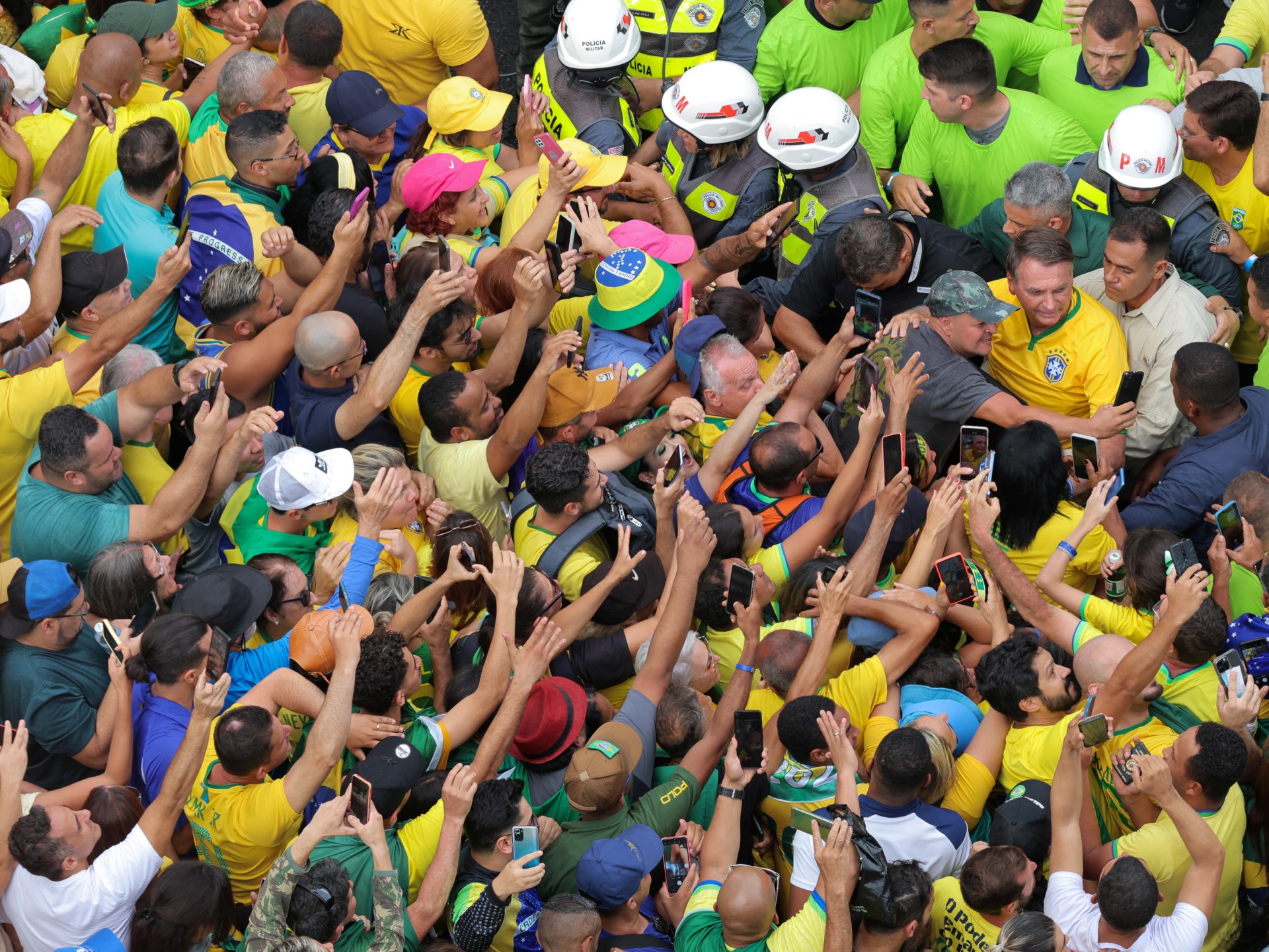 Thousands of Brazilians rally in support of Bolsonaro amid coup probe – Al Jazeera English